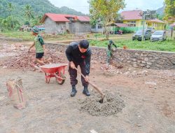 SATGAS TMMD KE-129 KODIM 0306/50 KOTA LANJUTKAN PEMBANGUNAN TALUD PENAHAN TANAH