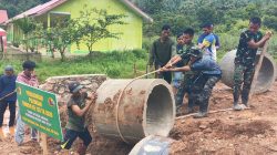 Satgas TMMD Ke-129 Kodim 0306/50 Kota Percepat Pemasangan Gorong-gorong Bersama Warga