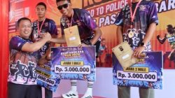 Kapolres Pasaman Barat AKBP Agung Tribawanto Serahkan Hadiah Juara Bhayangkara Run 2026